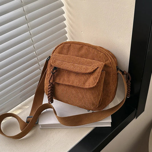 REVOSSA™ CORDUROY CROSSBODY BAG